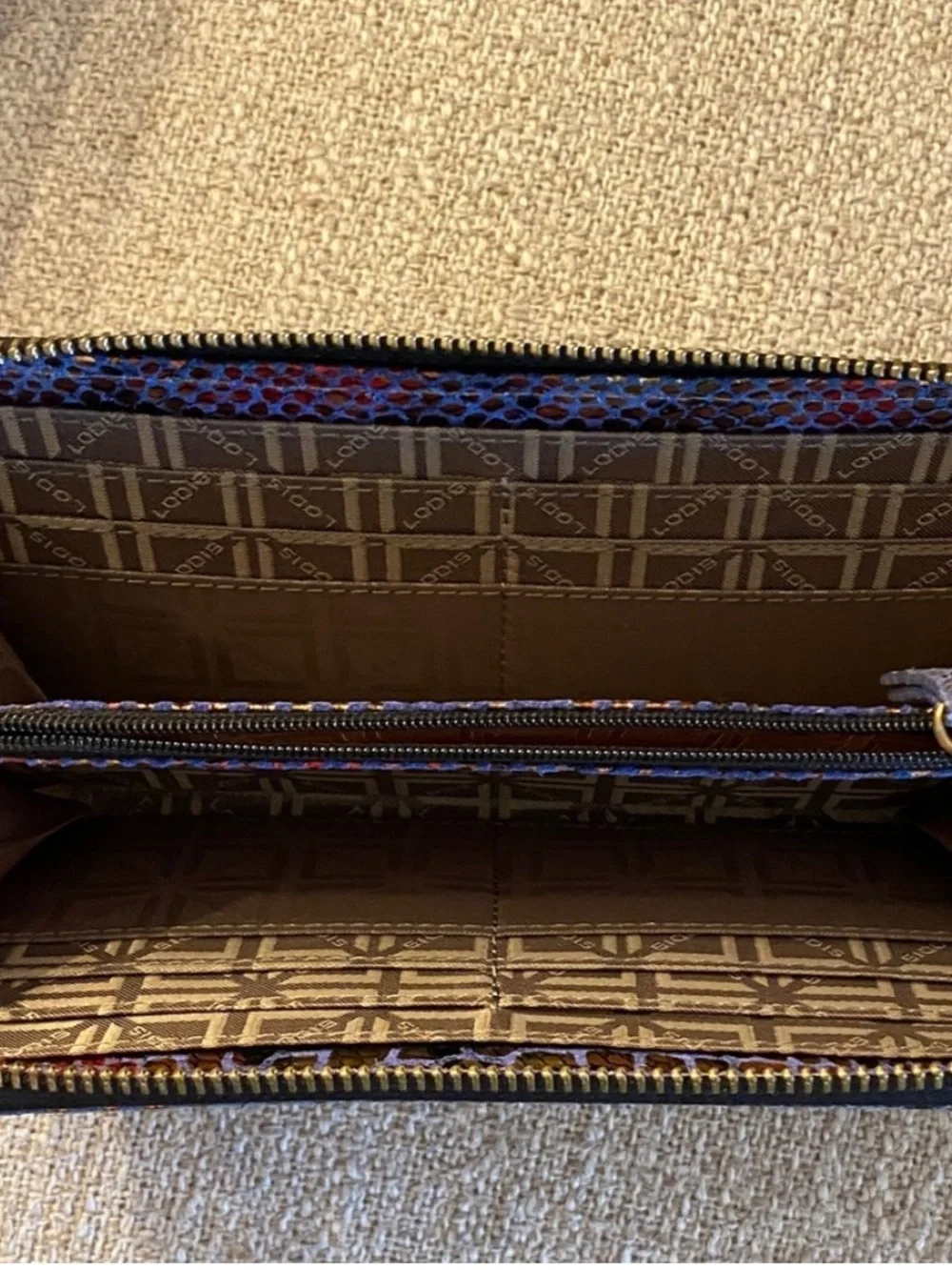 Lodis Embossed Snake Print Zip Around Wallet Brown Rust